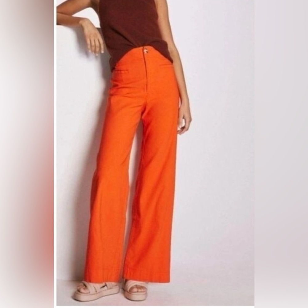Safety orange, slit pockets, stovepipe leg, flattering on any shape.